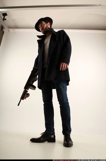 Man Adult Athletic White Fighting with submachine gun Standing poses Coat