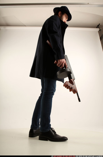 Man Adult Athletic White Fighting with submachine gun Standing poses Coat