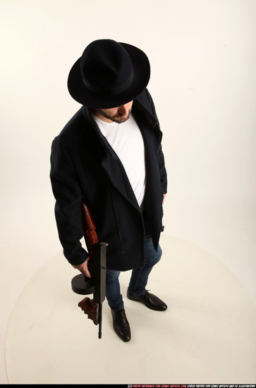 Man Adult Athletic White Fighting with submachine gun Standing poses Coat