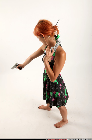 Woman Young Athletic White Fighting with gun Standing poses Casual