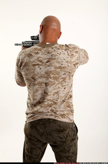 Man Adult Athletic Black Fighting with submachine gun Standing poses Army