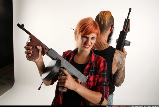 Man & Woman Adult Athletic White Fighting with submachine gun Standing poses Casual