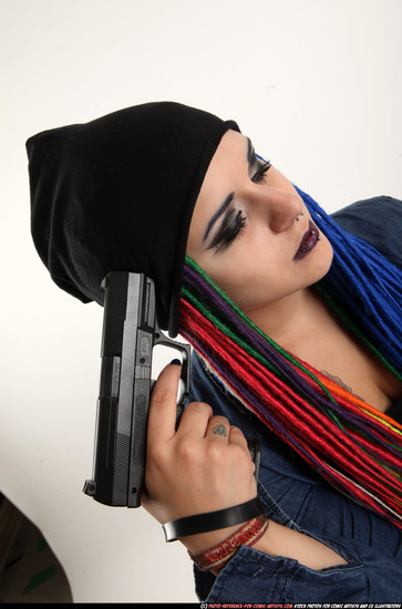 Woman Young Average White Fighting with gun Sitting poses Casual