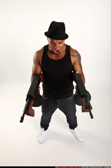 Man Adult Athletic Black Fighting with submachine gun Standing poses Casual