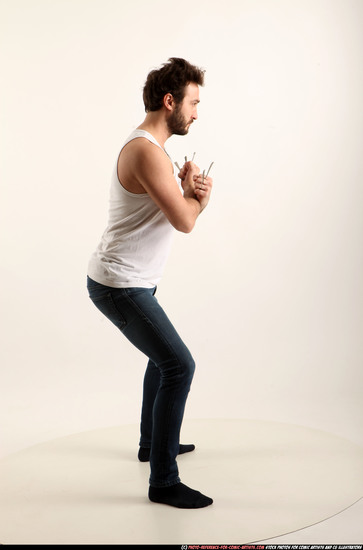 Man Adult Athletic White Fighting without gun Standing poses Casual