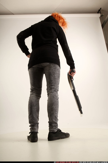 Woman Adult Athletic White Standing poses Casual Fighting with shotgun