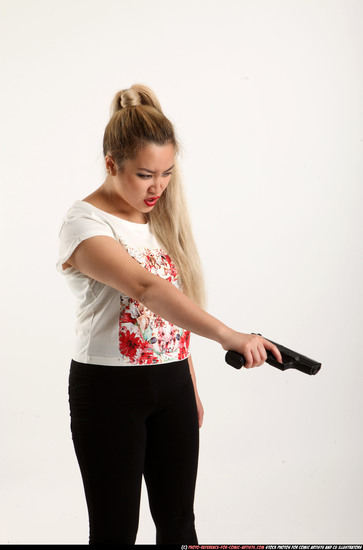 Woman Young Average Fighting with gun Standing poses Casual Asian