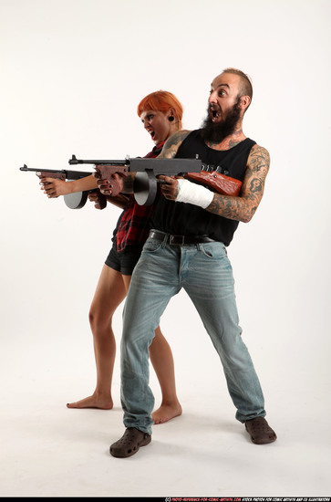 Man & Woman Adult Athletic White Fighting with submachine gun Sitting poses Casual