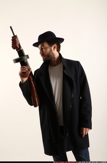 Man Adult Athletic White Fighting with submachine gun Standing poses Coat