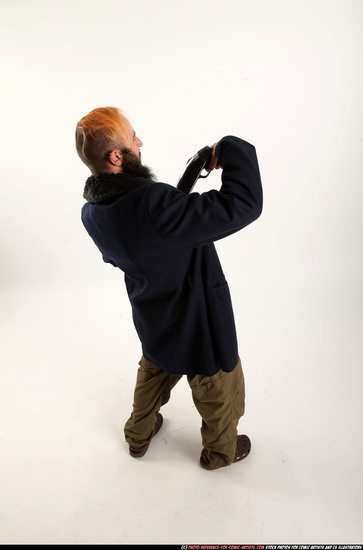 Man Adult Athletic White Standing poses Coat Fighting with shotgun