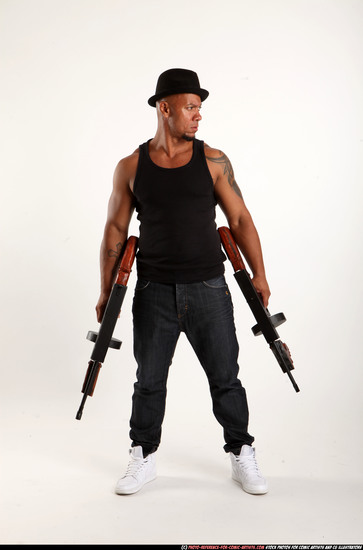 Man Adult Athletic Black Fighting with submachine gun Standing poses Casual