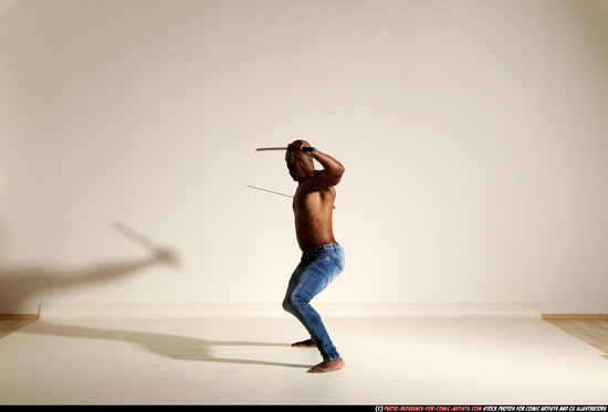 Man Adult Athletic Black Fighting with sword Moving poses Pants