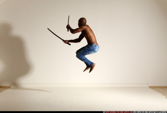 Man Adult Athletic Black Fighting with sword Moving poses Pants