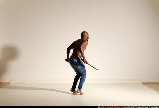 Man Adult Athletic Black Fighting with sword Moving poses Pants