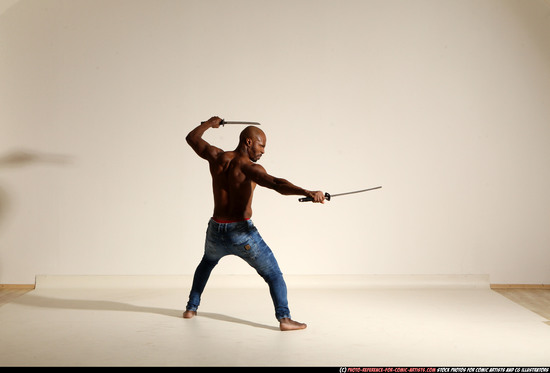 Man Adult Athletic Black Fighting with sword Moving poses Pants