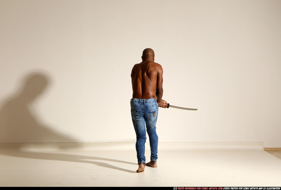 Man Adult Athletic Black Fighting with sword Moving poses Pants