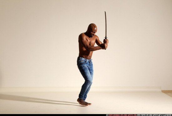 Man Adult Athletic Black Fighting with sword Moving poses Pants