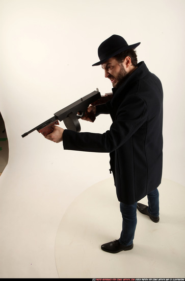 Man Adult Athletic White Fighting with gun Standing poses Coat