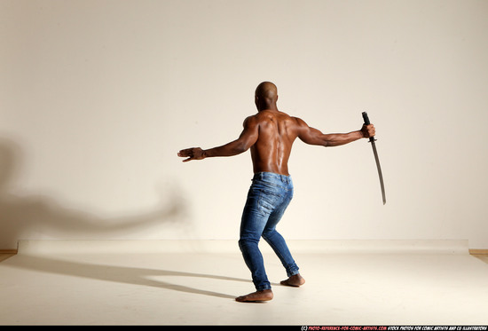 Man Adult Athletic Black Fighting with sword Moving poses Pants