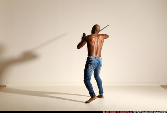 Man Adult Athletic Black Fighting with sword Moving poses Pants