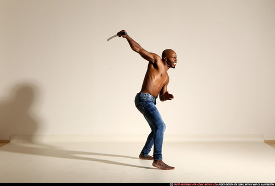 Man Adult Athletic Black Fighting with sword Moving poses Pants