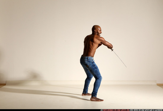 Man Adult Athletic Black Fighting with sword Moving poses Pants