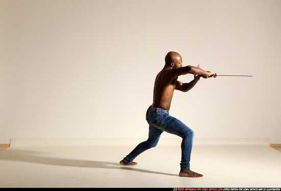 Man Adult Athletic Black Fighting with sword Moving poses Pants