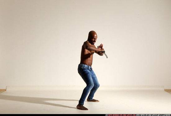 Man Adult Athletic Black Fighting with sword Moving poses Pants