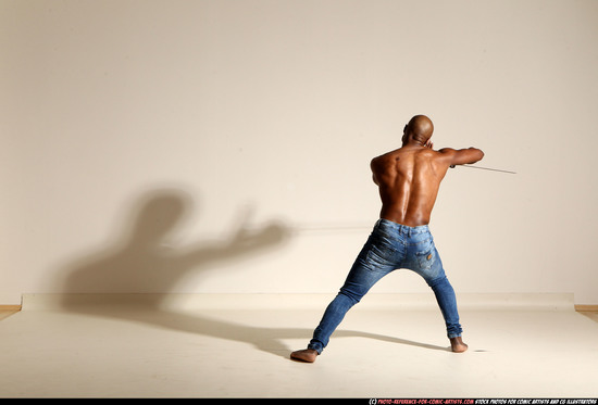 Man Adult Athletic Black Fighting with sword Moving poses Pants