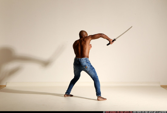 Man Adult Athletic Black Fighting with sword Moving poses Pants