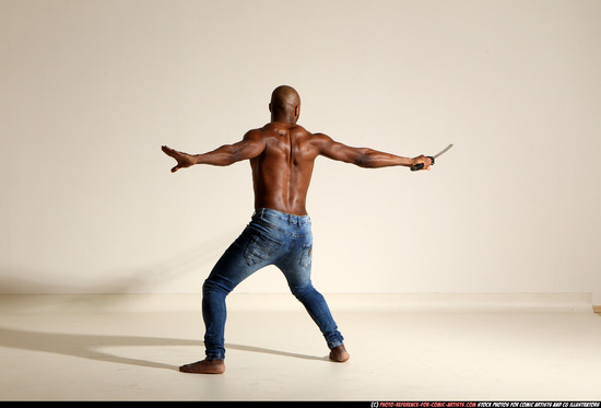 Man Adult Athletic Black Fighting with sword Moving poses Pants