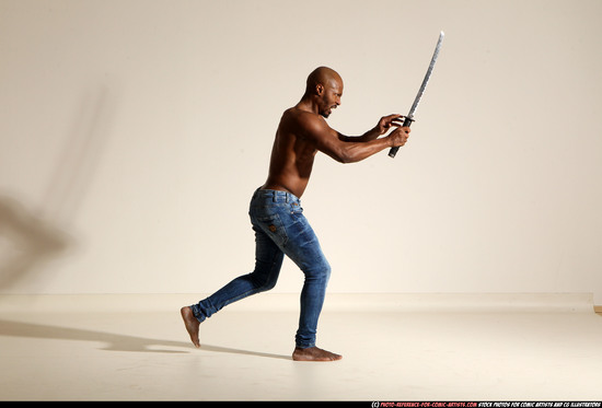 Man Adult Athletic Black Fighting with sword Moving poses Pants