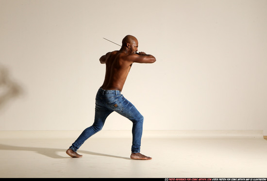 Man Adult Athletic Black Fighting with sword Moving poses Pants