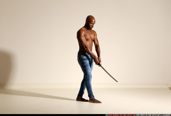 Man Adult Athletic Black Fighting with sword Moving poses Pants