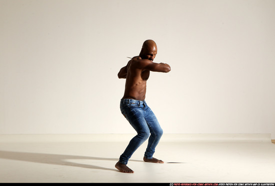 Man Adult Athletic Black Fighting with sword Moving poses Pants