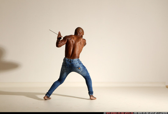 Man Adult Athletic Black Fighting with sword Moving poses Pants