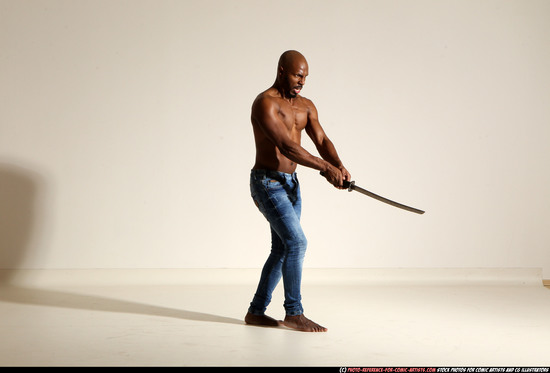 Man Adult Athletic Black Fighting with sword Moving poses Pants