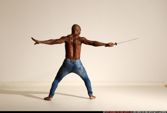 Man Adult Athletic Black Fighting with sword Moving poses Pants