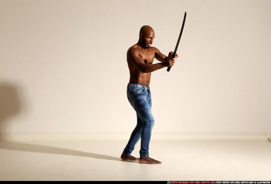 Man Adult Athletic Black Fighting with sword Moving poses Pants