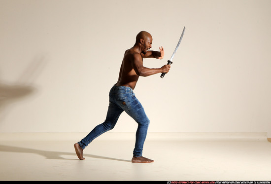 Man Adult Athletic Black Fighting with sword Moving poses Pants