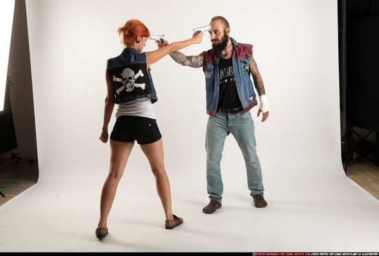 Man & Woman Adult Athletic White Fighting with gun Standing poses Casual