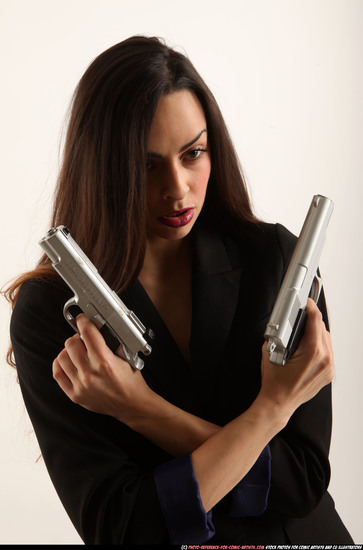 Woman Adult Athletic White Fighting with gun Standing poses Casual