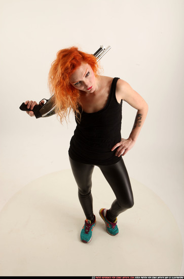 Woman Adult Athletic White Standing poses Casual Fighting with shotgun