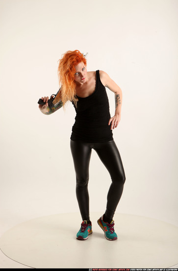 Woman Adult Athletic White Standing poses Casual Fighting with shotgun