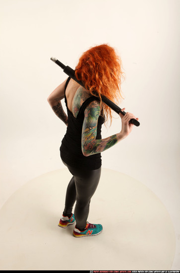 Woman Adult Athletic White Standing poses Casual Fighting with shotgun