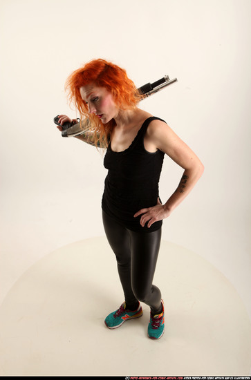 Woman Adult Athletic White Standing poses Casual Fighting with shotgun