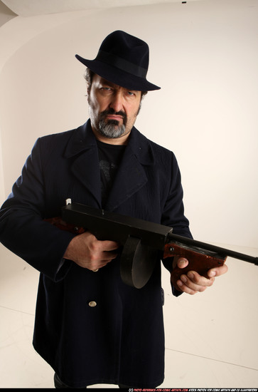 Man Old Average White Fighting with gun Standing poses Coat