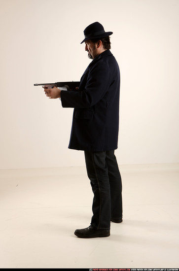 Man Old Average White Fighting with gun Standing poses Coat