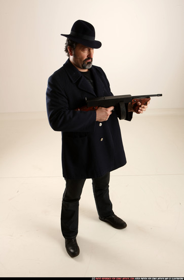 Man Old Average White Fighting with gun Standing poses Coat