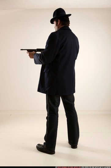 Man Old Average White Fighting with gun Standing poses Coat